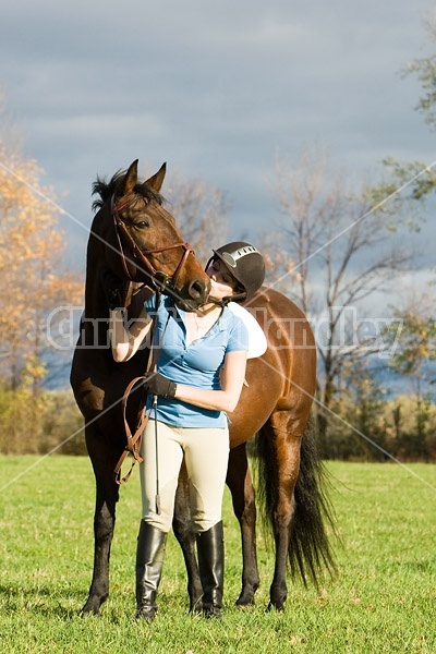 Young woman and her horse