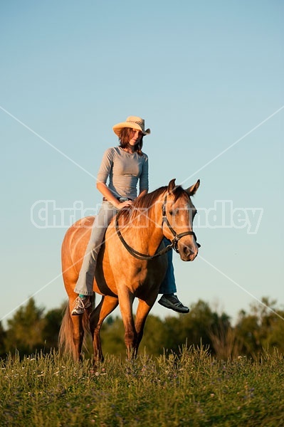 Teenage girl riding bareback