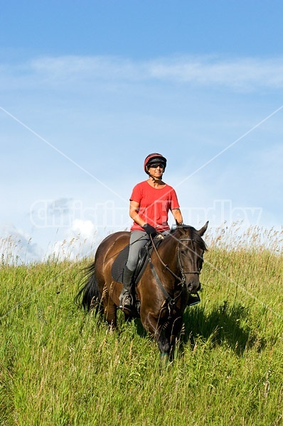 Woman horseback riding