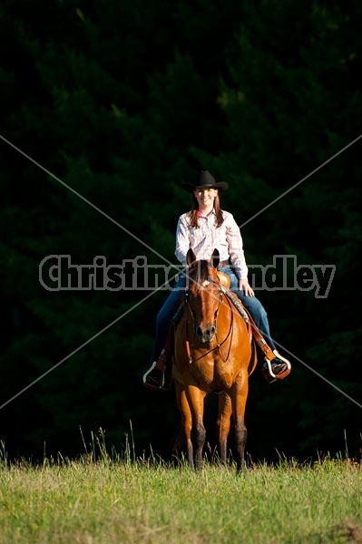 Young woman trail riding in Ontario Canada