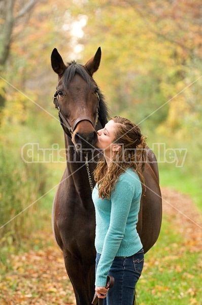 Young woman and her horse