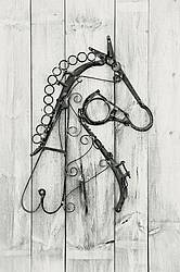Hand crafted metal horse head made out of recycled and repurposed farm tools and machinery parts then welded together