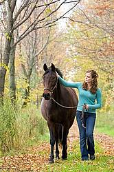 Young girl with horse