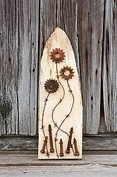 Hand crafted Flower Garden art sign made out of wood and recycled or repurposed farm tools and machinery parts
