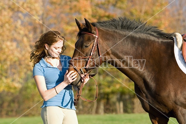 Young woman and her horse