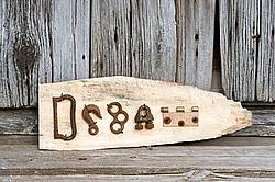 Hand crafted Dream art sign made out of wood and recycled or repurposed farm tools and machinery parts