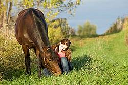 Young woman and her horse