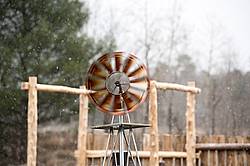 Windmill in barn yard